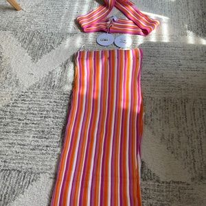 Brand new skirt and shirt set with slit on the side